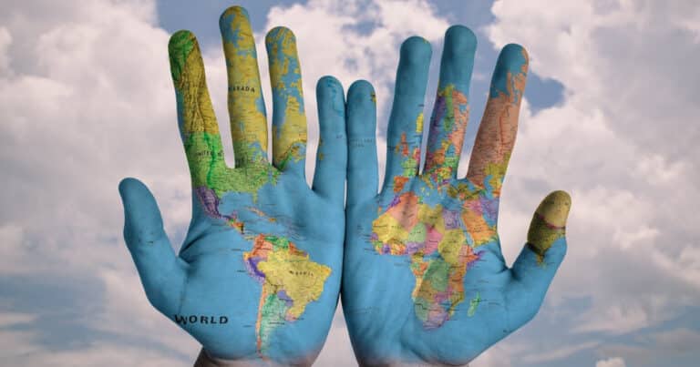 Map of world painted on hands