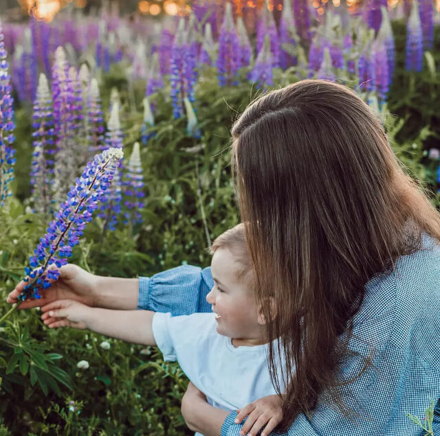 Human beings Mother and child in the meadow