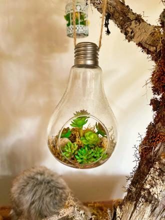 Light bulb with greenery