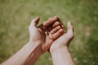 man holding a seed