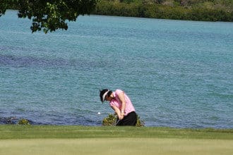 woman playing golf