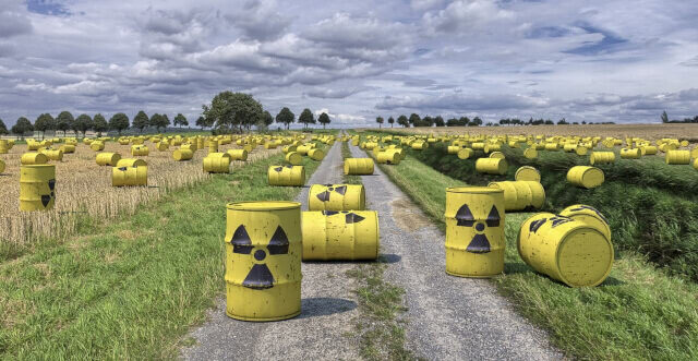 Nuclear waste Dozens of yellow nuclear waste barrels