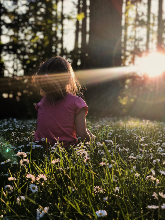 consciousness | The Interfaith Center for Sustainable Development A young girl enjoying sunlight in the wood