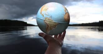 Man holding earth globe